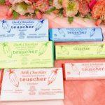 A group of different types of chocolate bars.