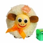 A stuffed animal with a face on it