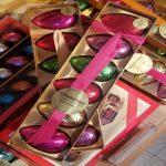 A close up of several boxes of chocolates