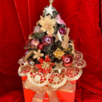 A christmas tree made of fabric and lace.