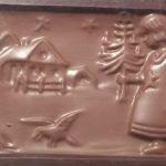 A chocolate bar with a picture of santa clause