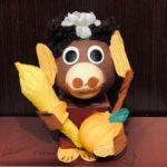 A monkey made out of bananas and paper mache.